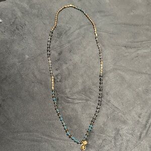 Marlyn Schiff Beaded Necklace with Gold, Blue, Grey, and brown Accents. A28